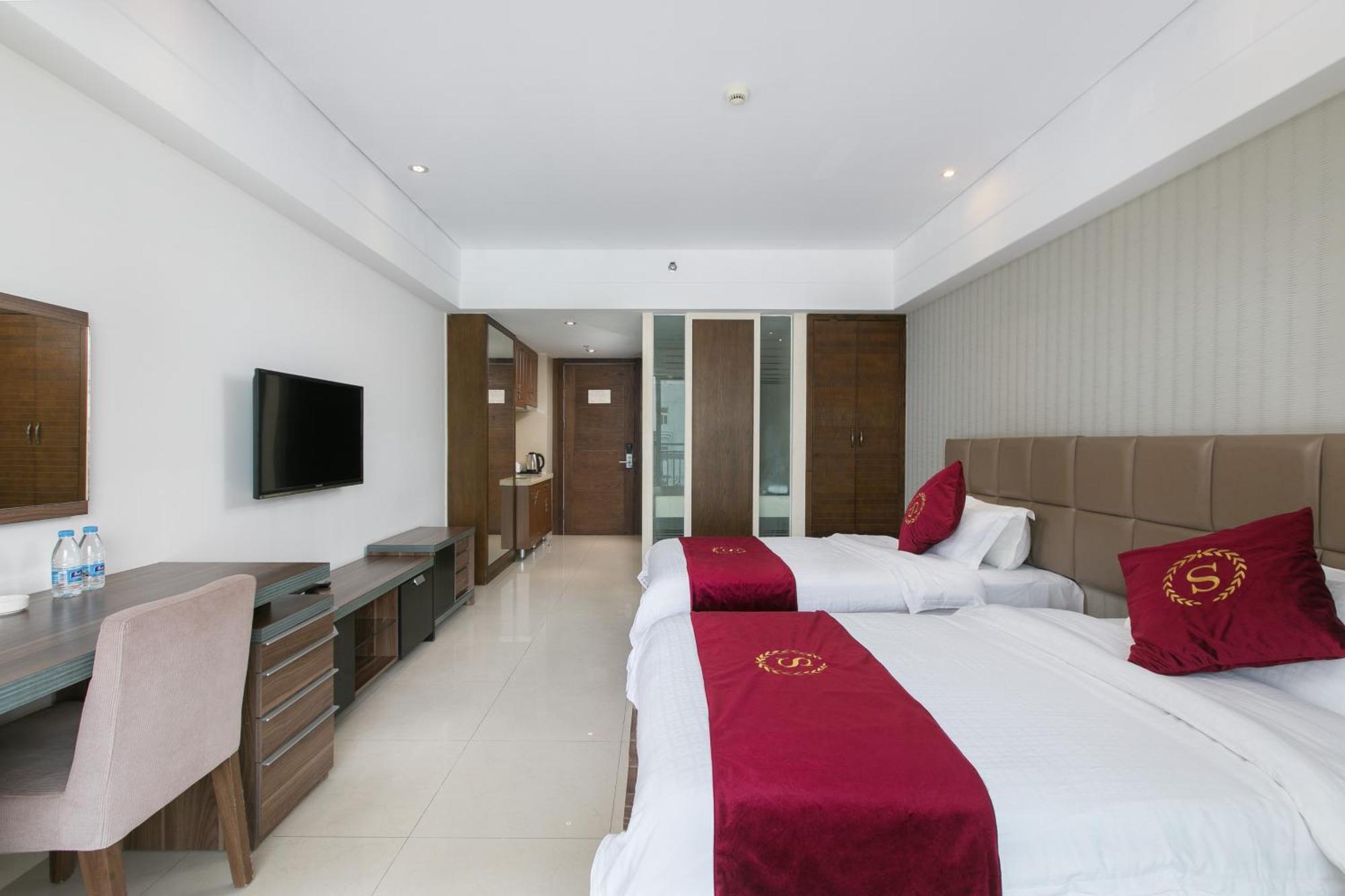 Апарт готель Sanya Sun And Sea Gueshouse Номер фото